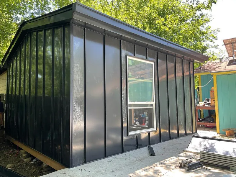 Black standing seam metal wall panels for Roof Inspection in Murillo