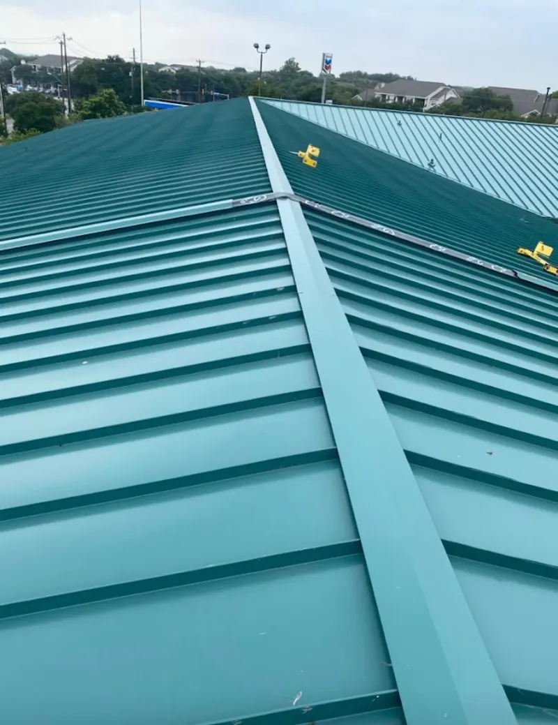 Green commercial metal roof ridge and valley for Metal Roof Repair in Murillo